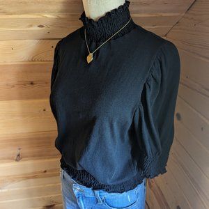 AMO Black Smocked Mockneck Puff Sleeve Top